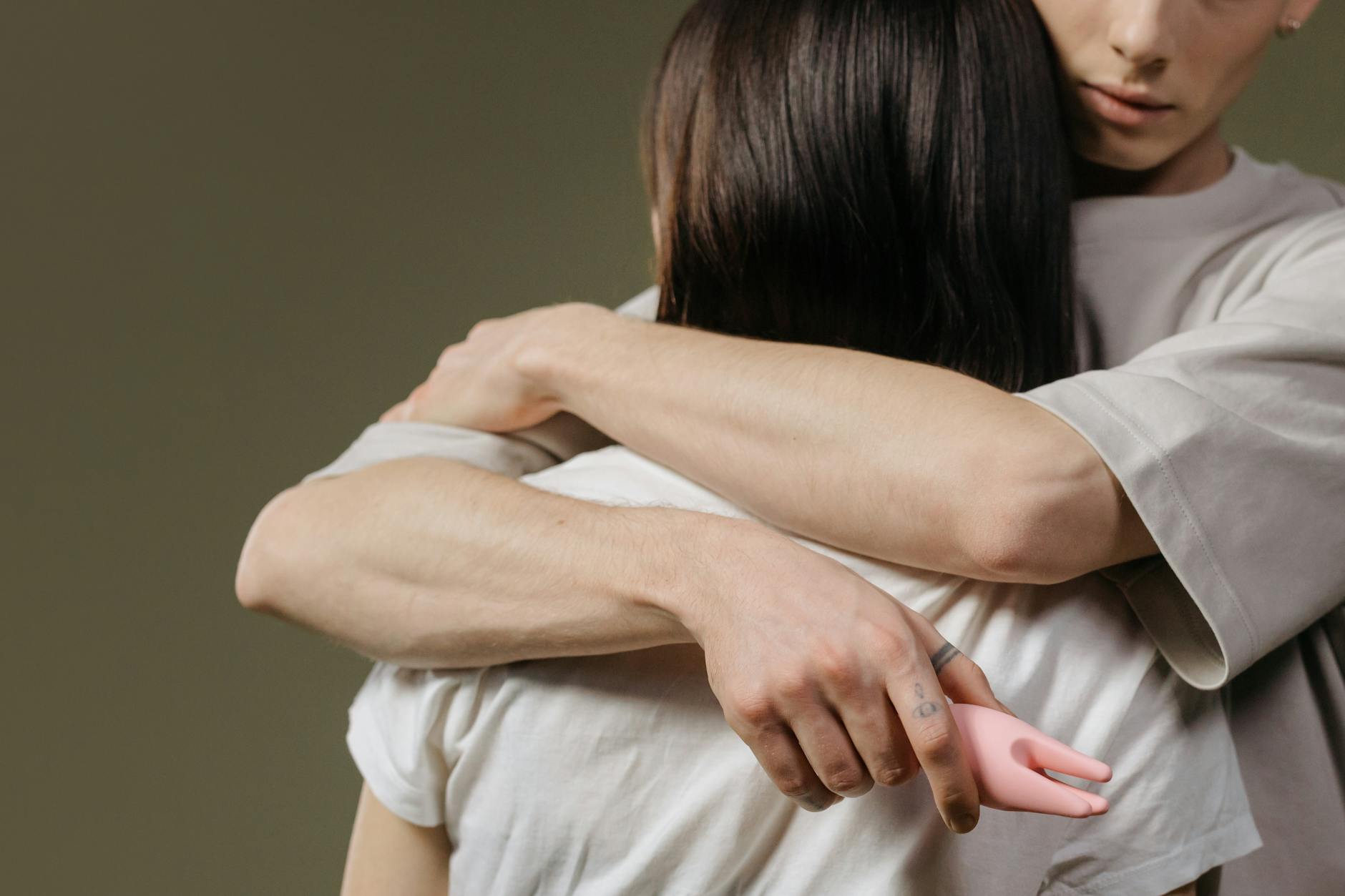 A couple embracing and reconnecting with intimacy and trust after difficult times.